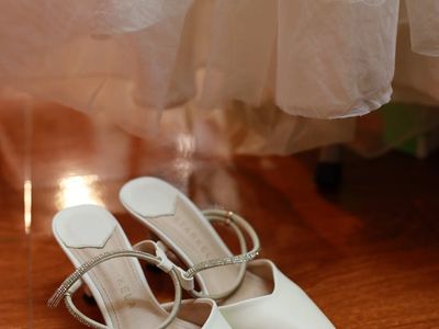 Details of specialized cardio footwear on a dark floor.